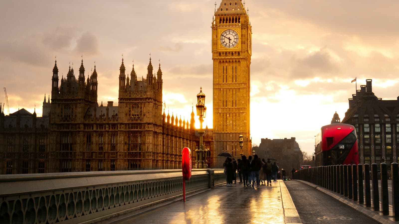 Big Ben and the Houses of Parliament lit up at sunset in London